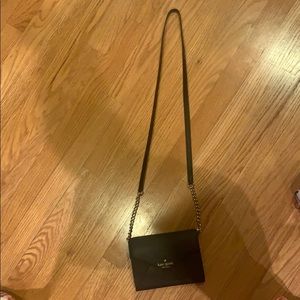 Black and gold Kate Spade cross body bag